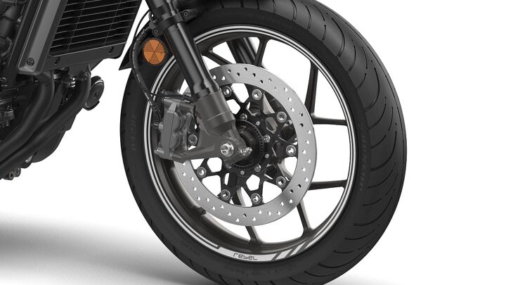2021 honda rebel 1100 first look updated, A lone 330mm floating rotor acted on by a four piston monoblock radial mount caliper looks plenty up to the task Out back there s a single 256mm disc ABS is standard equipment S