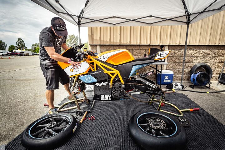 the lightfighter electric superbike is back and better than ever, The real MVP of this whole operation Brian Wismann slinging tires and taking off bodywork All in an effort to find speed Photo Stephen Gregory