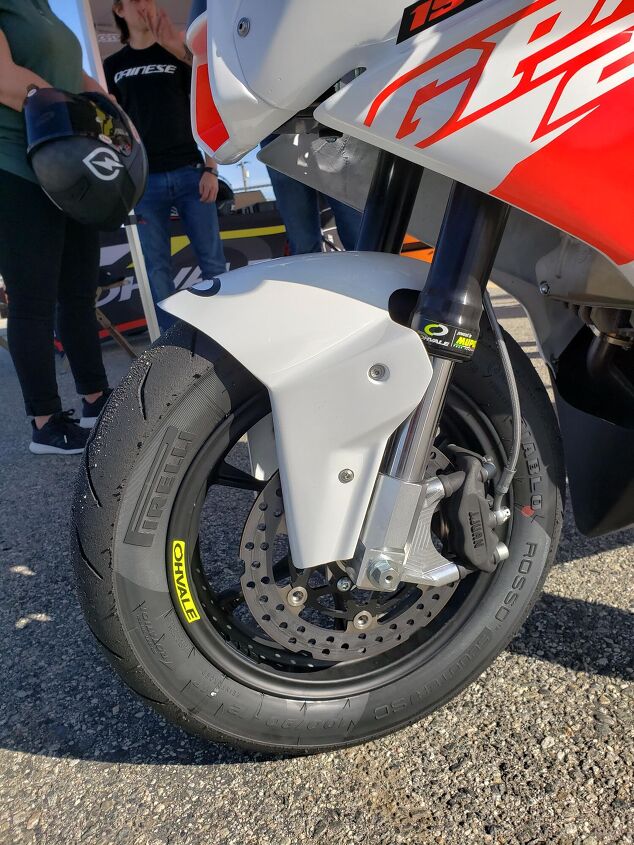 2021 ohvale gp 2 review first ride, It s not often you find inverted forks on such a little bike Also cool is the radial mount four piston caliper though a little extra bite would have been nice The Pirelli Diablo Rosso Scooter SC tires never leave you wanting for grip