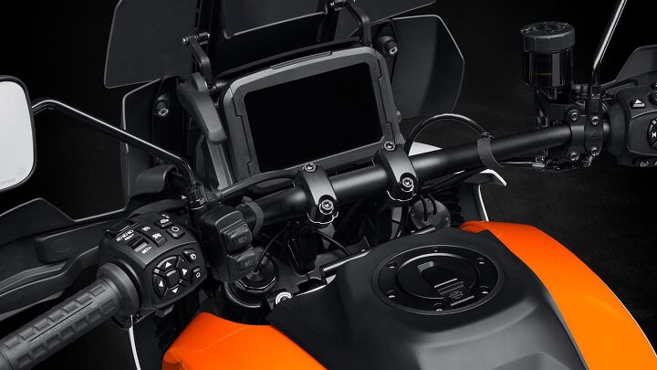 2021 harley davidson pan america 1250 first look, The cockpit features a ton of controls Look closely and you ll see the semi active suspension