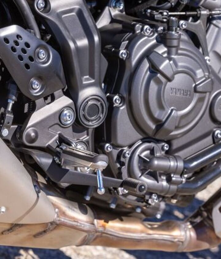 2021 yamaha mt 07 review, There are a lot of little changes made to the engine but you can t see most of them The biggest visual difference is the new exhaust with the collector positioned as close to the exhaust port as possible Hence the heat shield