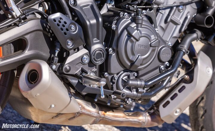 2021 yamaha mt 07 review, There are a lot of little changes made to the engine but you can t see most of them The biggest visual difference is the new exhaust with the collector positioned as close to the exhaust port as possible Hence the heat shield