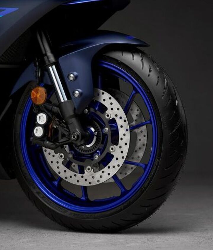 the wraps are off yamaha unveils the new 2022 yzf r7, An inverted fork and radial calipers should provide both improved handling and stopping capabilities over the MT 07 The 298mm rotors are unchanged