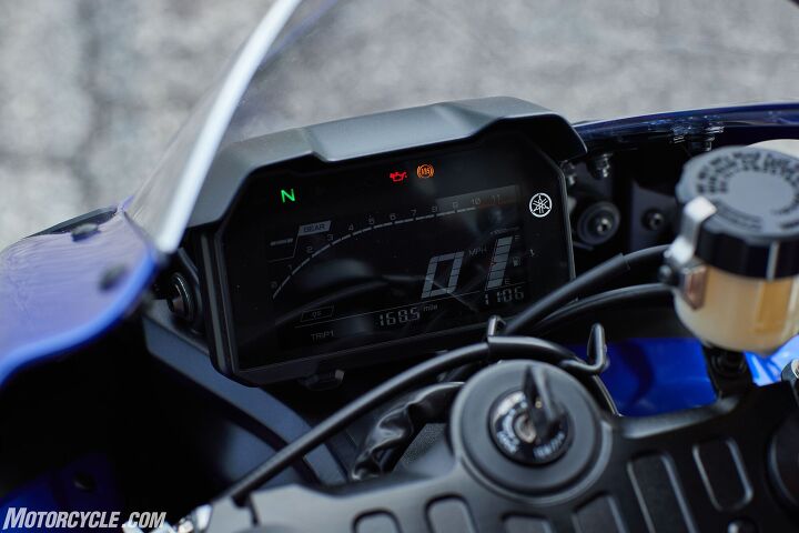 2022 yamaha yzf r7 review first ride, Adding a TFT screen would have increased costs so the R7 uses an elegant LCD But it can be hard to read at times It s even hard to read in this photo