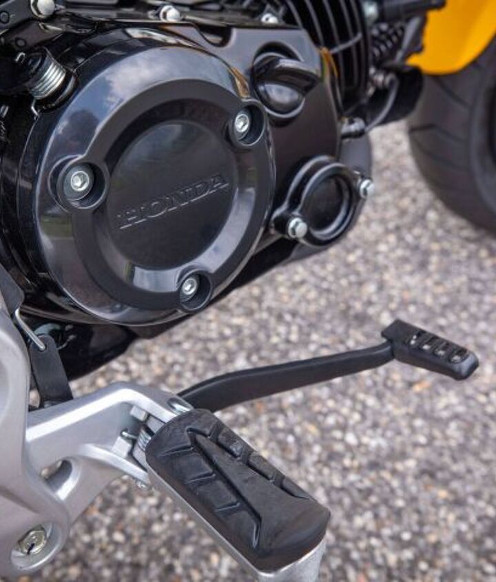2022 honda grom review first ride, An oil filter Praise the Lord There s also a sight glass also a new feature The manual calls for oil changes every 4 000 miles seems a long interval for a mere quart capacity