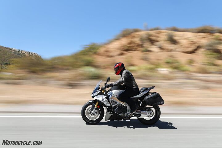 2021 aprilia tuono v4 review first ride, Higher handlebars slightly more wind protection a larger passenger seat with grab handle and lower passenger pegs all point the Tuono V4 toward a bit of shall we call it hypernaked touring Sounds exciting