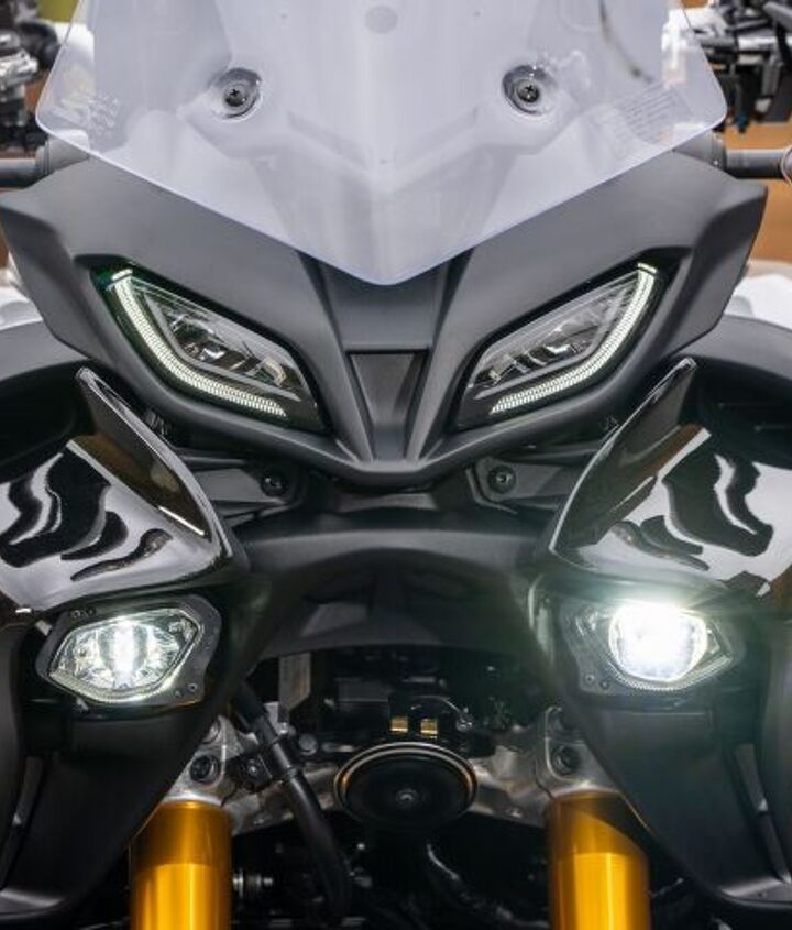 2021 yamaha tracer 9 gt review first ride, The Tracer 9 GT s face You can see clear R1 inspiration from the headlights but the LED lights above them bend into corners