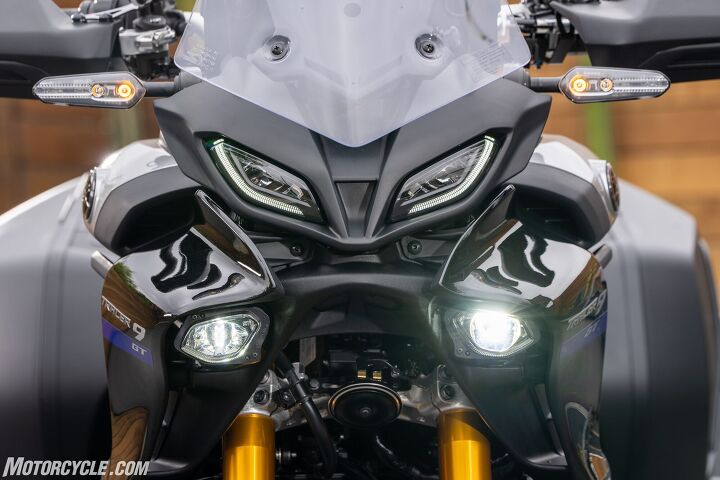 2021 yamaha tracer 9 gt review first ride, The Tracer 9 GT s face You can see clear R1 inspiration from the headlights but the LED lights above them bend into corners