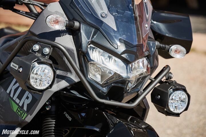 2022 kawasaki klr 650 review first ride, The KLR now finally uses a more modern sealed battery and has an AC generator with a 26A output A total of 80W is available to power accessories like these fog lamps