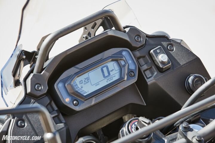 2022 kawasaki klr 650 review first ride, A new LCD display replaces the old analog gauges of the previous gen While I ve championed for modern displays throughout the years I think this is the first time I would rather have the old set up back The LCD unit gives you a speedo odometer trip 1 2 a clock and a fuel gauge as well as indicator lamps for potential issues but a tachometer and temperature gauge are sorely missed The accessory bar above the display just behind the windshield is convenient though