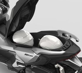 2022 honda adv350 first look from afar, Practicality has not been forgotten there s room for two full face helmets under the seat USB charger in the glovebox and convenience of Smart Key operation The screen is height adjustable and the LCD dash also integrates the Honda Smartphone Voice Control system
