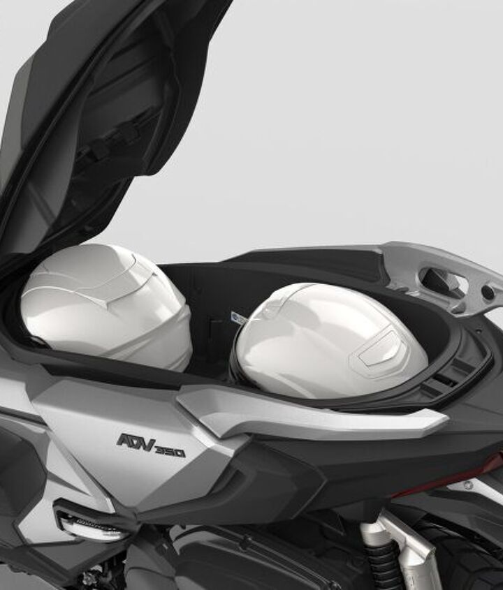 2022 honda adv350 first look from afar, Practicality has not been forgotten there s room for two full face helmets under the seat USB charger in the glovebox and convenience of Smart Key operation The screen is height adjustable and the LCD dash also integrates the Honda Smartphone Voice Control system