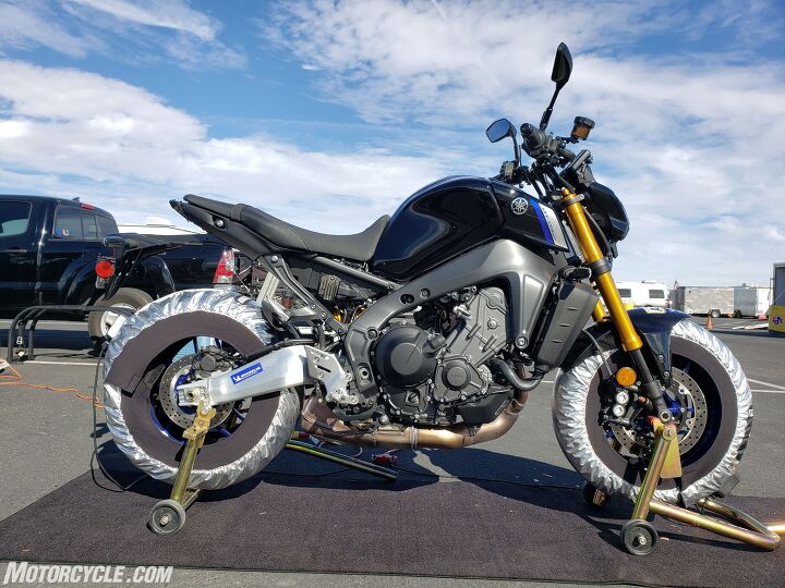 2021 yamaha mt 09 sp review street and track, Intimidation likely isn t what you d be feeling if you were to pull up to a racetrack on the eve of a club race weekend and see this I m happy to report the ol Yamaha did surprisingly well and more than held her own If I were smart I would have moved the pegs to their higher position But I m not