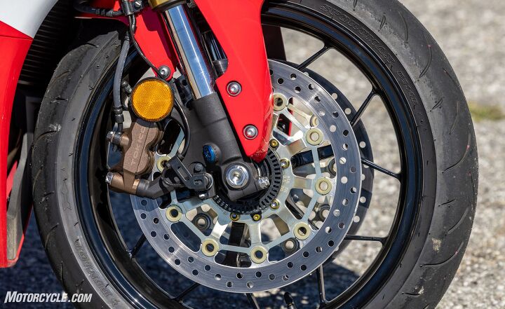 2021 honda cbr600rr review first ride, Excellent feel and one finger power the little CBR is a masterful trail braker The adjuster at the bottom of the Big Piston Fork is for spring preload