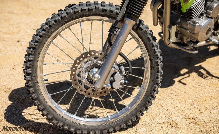 2022 kawasaki klx140 r l review, The 19 inch front tire and 16 inch rear also assist in the bigger bike feel of the little KLX The single 220mm petal disc and the two piston caliper are pretty basic but they get the job done