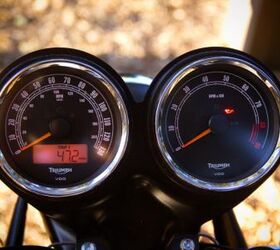 church of mo 2012 triumph scrambler review, The Scrambler is fitted with dual gauges framed by chrome bezels The LCD odo clock is a giveaway they re not vintage Smiths