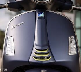 2023 vespa gts300 review first ride, LED lighting all around and the famed Vespa necktie is still front and center