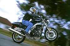 church of mo first ride 2002 triumph speed triple, On the Triumph you re kind of a tough guy see It s so James Bond It so well it s just plain cool