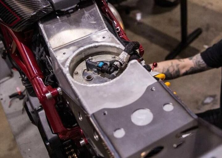 The custom RSD fuel cell moves the weight of the fuel from its traditional location to further back and under the seat to help with weight distribution.