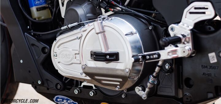 The billet clutch cover is reshaped to allow extra ground clearance, but it also relocates the clutch pull from below the case to the top. Note also the custom rearsets and quickshifter.