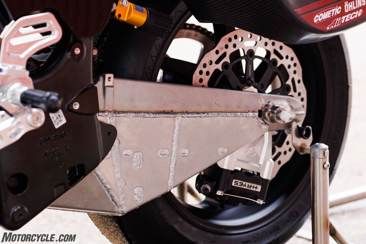 The swingarm bracing is serious, as seen here. You’ll find the stock Challenger swingarm above the weld, and everything below is added on for additional bracing. Note also the fully floating brake rotor and Hayes radial-mount caliper.