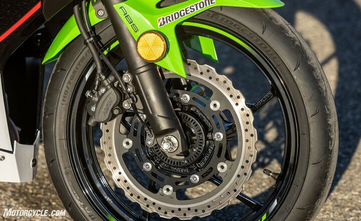 showdown 2022 kawasaki ninja 400 vs ktm rc390 at the track, Despite being inferior on paper the Kawasaki s smaller rotor axial caliper and rubber lines are decent though a tight track with lots of heavy braking would be a distinct disadvantage for the Ninja