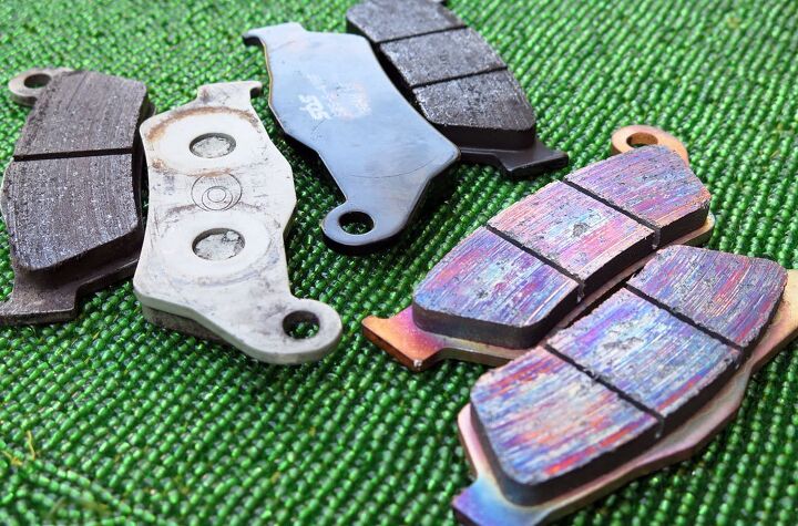 mo better sbs brake pad review, The stock ceramic pads are at left the SBS ceramics are in the middle and the SBS sinters at bottom right all after being run on the bike Can you guess which pads most efficiently turn velocity into heat