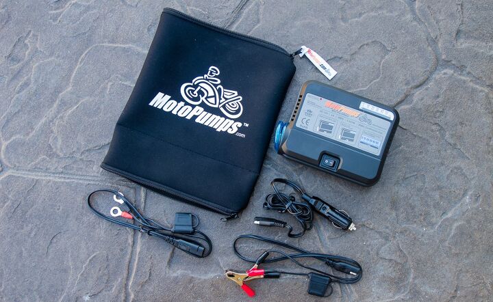 motopumps mini pro review, Deluxe accommodations The basics Mini Pro and cigarette adapter plus fused battery clips and permanent fused battery rings Although the case is good for long term storage the Deluxe Kit takes up significantly more room on a bike than just the pump and a single adapter