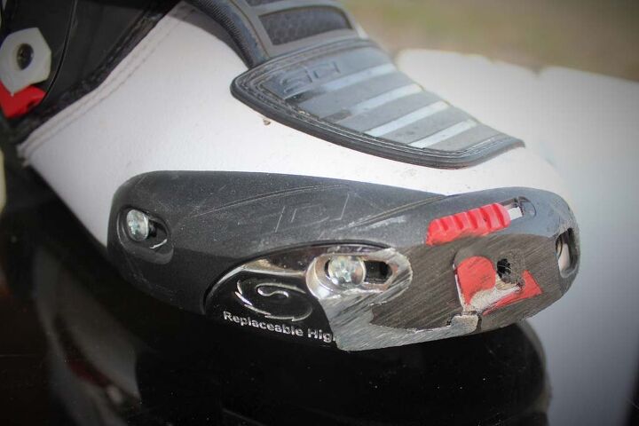 sidi mag 1 boot review, The sad shape of these toe sliders resulted from my wonky ankle not allowing an optimum position on the footpegs of KTM s RC390 New fiberglass reinforced nylon sliders will restore these boots to like new status