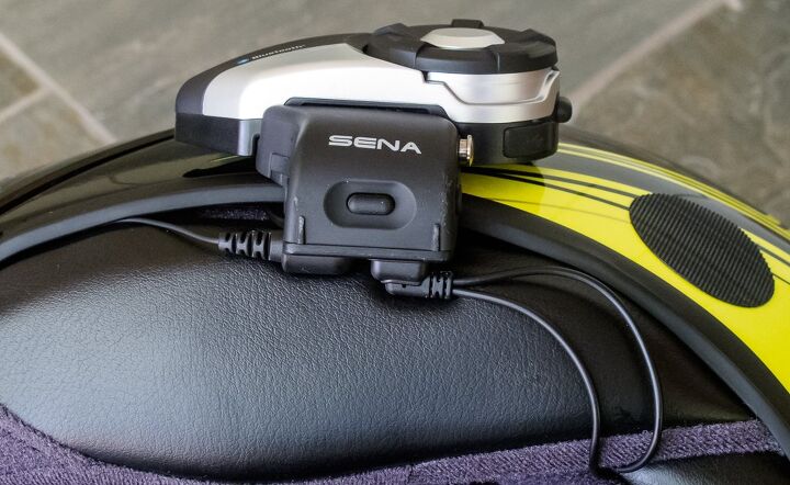 sena 20s motorcycle bluetooth communication system review, The Ambient Mode button initiates both Group Intercom sessions and its namesake mode The inner facing microphone and speaker ports make routing the cables easy
