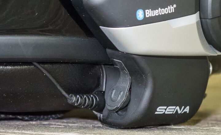 sena 20s motorcycle bluetooth communication system review, One clever feature of the 20S is the auxiliary jack that automatically disconnects the helmet speakers when you decide to use noise damping earbuds on longer rides Earbuds allow you to hear the music better at lower volumes for less rider fatigue