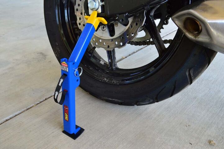 mo tested tirox snapjack, Place the base of the SnapJack approximately three or four inches from the rear tire with the swingarm cradle positioned on a flat portion of the swingarm