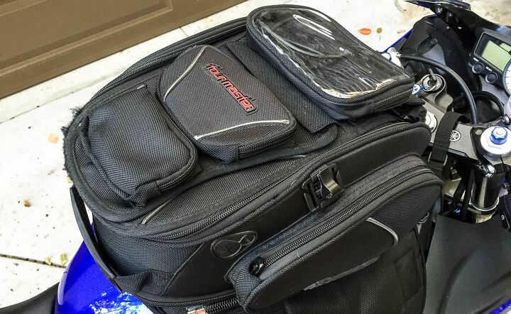 mo tested tourmaster elite tri bag tank bag, The setup that looks the most like your typical tank bag Oodles of versatility Note the fraying trim on the left edge of the bag that was caused by the hook and loop fasteners on riding gear closures