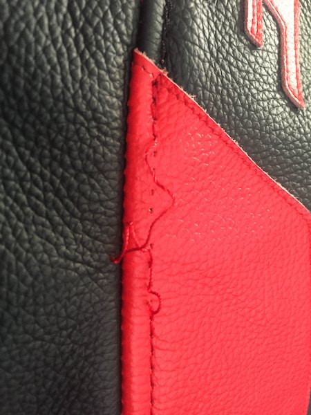mo tested dainese veloster perforated one piece leather suit, We found some runaway stitching on the left leg of the Veloster suit This type of defect a malfunctioning zipper a broken zipper pull or stitching that is loose popped open or broken is covered for one year from date of purchase