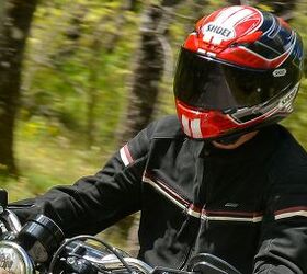 Motorcycle helmets with transition clearance shields