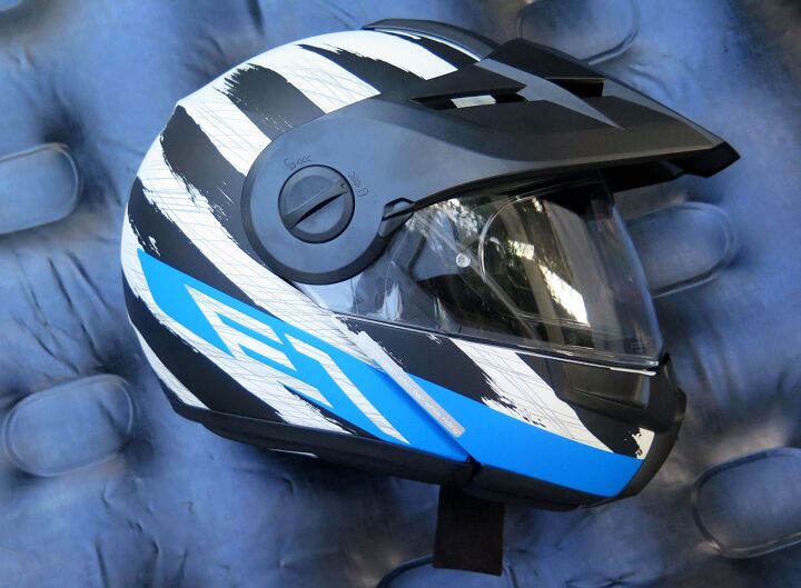 mo tested schuberth e1 modular helmet, I call this one Hunter Blue E1 on Air Mattress The beak pops off and on easily and ratchets into three positions this one being lowest The matte finish seems like it will be more resistant to abuse than shiny paint which is a good thing in an Adventure helmet that s also designed for sporty touring