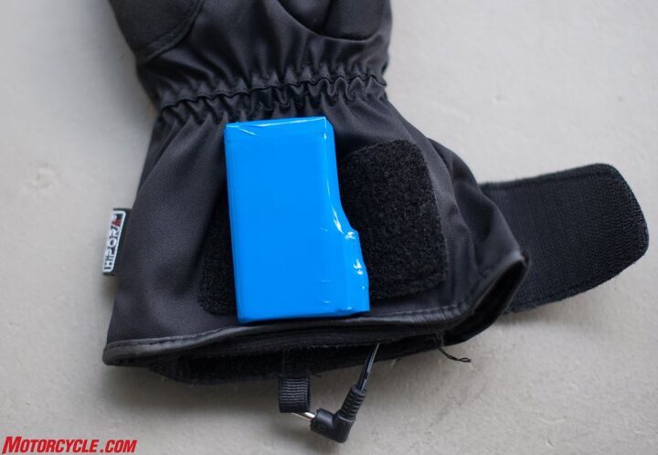 mo tested joe rocket rocket burner textile gloves, The lithium ion battery pack slips into a slot just below the Velcro pad the area in which the power cord is sticking out from
