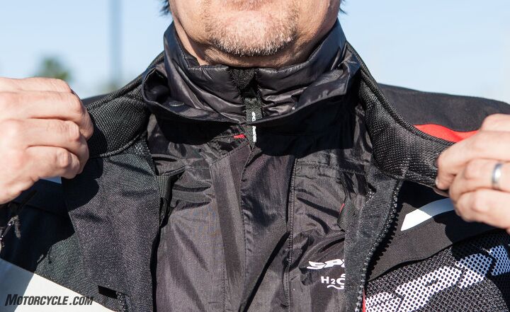 mo tested spidi 4season h2out suit review, While having to close three layers around the neck may seem a bit excessive it keeps the cold and wet out making it well worth the effort The layers are quilted zipped by neck H2Out unsnapped at neck and armored exterior held in fingers