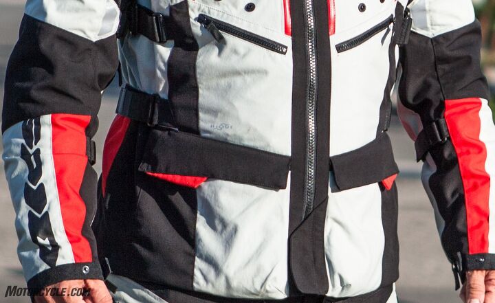 mo tested spidi 4season h2out suit review, The cargo pockets bottom offer plenty of storage but are not waterproof The zippered pockets top are good for items like change earplugs and keys