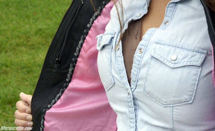 black brand mantra jacket review, The Black Brand logo between the leather and pink interior lining is the only place you ll find branding besides the BB initials on the snaps of the shoulder straps it s a nice touch for women who appreciate subtlety The zippered lapel pocket is the only interior pocket