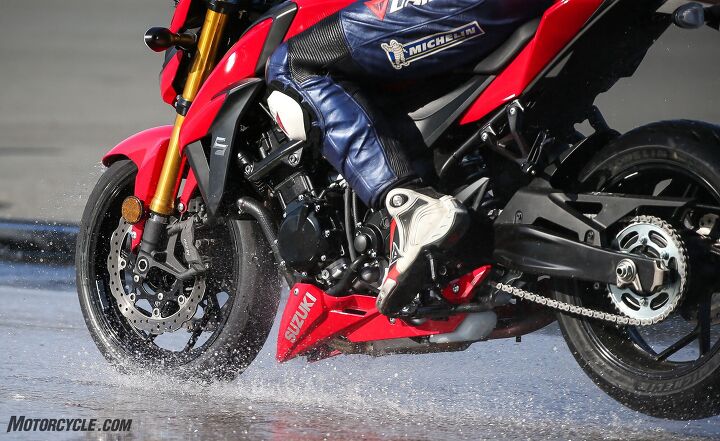 mo tested michelin road 5 tire review, Here the Michelin test rider illustrates how much stopping power is available in the wet with the Road 5