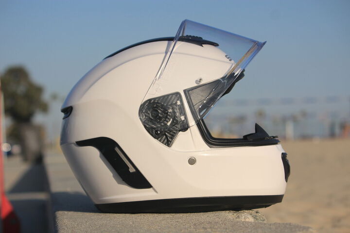 mo tested sena momentum helmet, The shield is easily removed with quick release spring loaded tabs on each side of the helmet Tinted shields should be available mid to late May