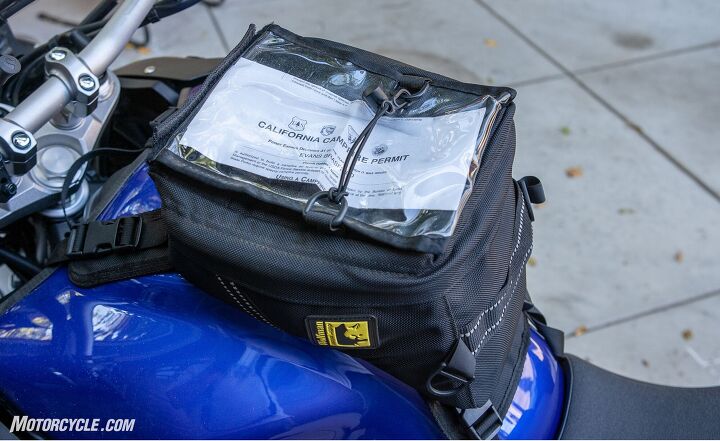 mo tested wolfman blackhawk tank bag review, Paper maps may not be as common as they used to be but the clear map pocket has many other uses Note the narrowness of the bag This keeps it from interfering with your legs when standing for off road riding