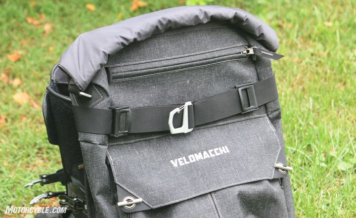 mo tested velomacchi speedway backpack 40l review, An aluminum clip on the back can be used for helmets hats or anything else you feel like clipping to the back of the pack