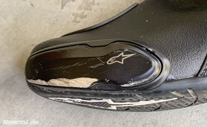 mo tested alpinestars supertech r boots review, The aluminum toe sliders offer better feel and longevity than plastic ones The notch at the top right gives access to the allen bolt that allows for slider replacement