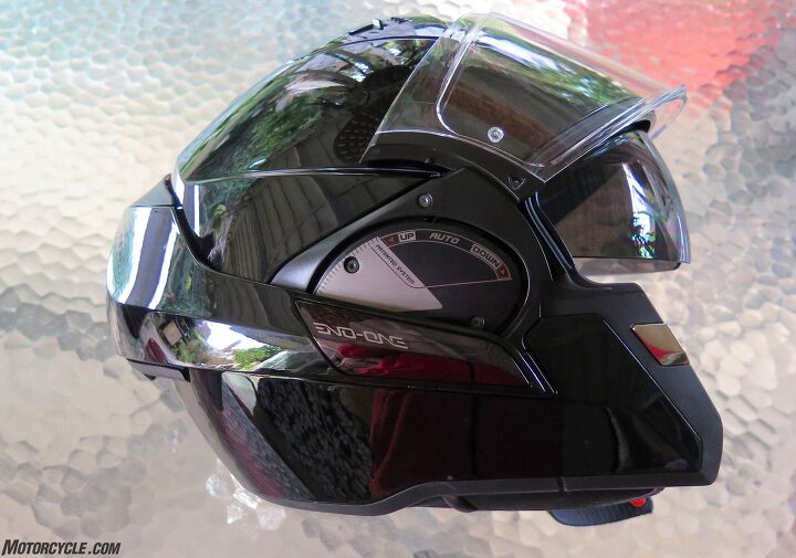 mo tested shark evo one 2 modular helmet review, Clever engineering indeed The internal sunshield provides some protection in open face mode After a little practice it s easy to rotate the chin bar back and forth with either hand