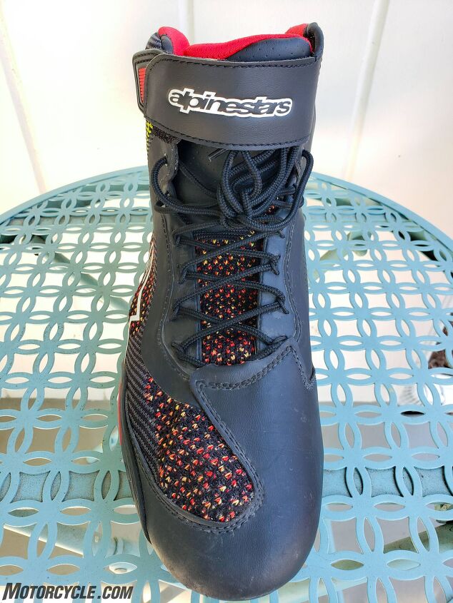 mo tested alpinestars faster 3 rideknit riding shoes, The mesh material is used through most of the tongue of the shoe as well Here you can also see the relatively narrow toe box shift pad lacing system and Velcro strap to keep it in place Speed lacing would be nice but it s not a deal breaker