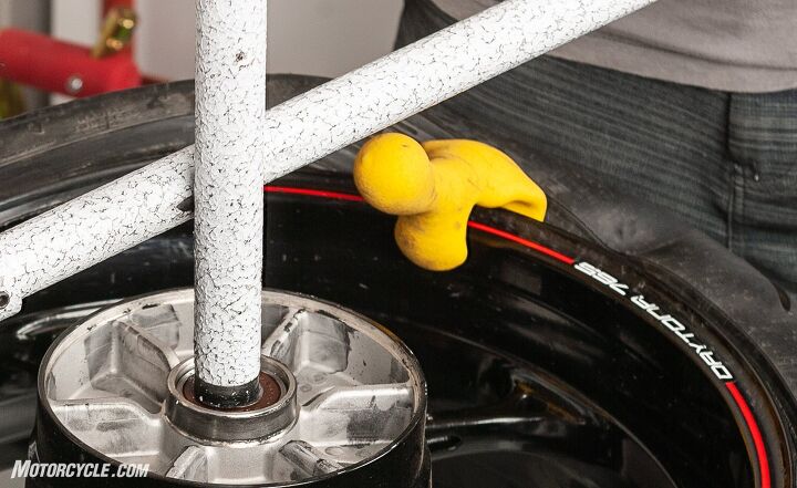 mo tested no mar classic hd motorcycle tire changer review, I ll leave you with a shot of the Yellow Thing doing its job of keeping the bead below the rim while the mount demount bar cranks the rest of the tire into place