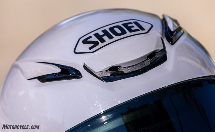 mo tested shoei rf 1400 helmet review, The forehead center vent now has two ports to allow air in to cool the rider The shape of the vent makes it much easier to open close with a gloved hand