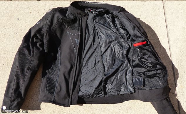 mo tested dainese super speed textile jacket review, Here the jacket is shown with the thin wind stopping liner half unzipped from the jacket s left side The only access to the inner pocket is by reaching behind the liner